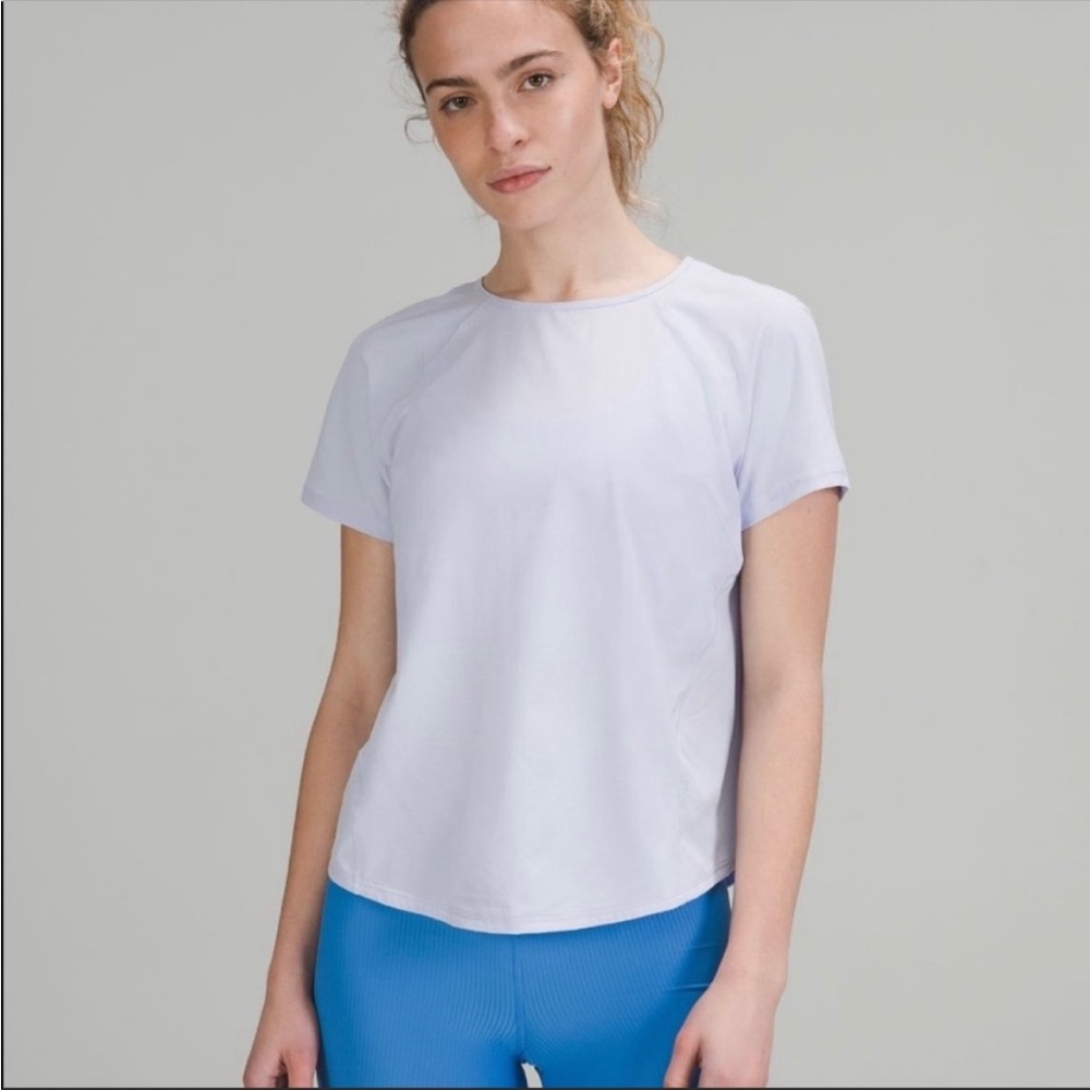 Brand new size 6 light weight stretch Lululemon shirt